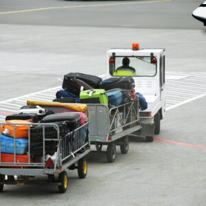 Luggage,Traffic,On,An,Electromobile,To,The,Plane